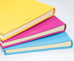 Real leather photo albums in a range of bright modern colours 